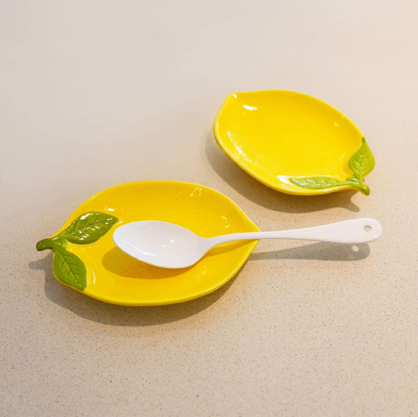 SEICASAYA Ceramic Spoon Rest Set of 2, Lemon Shaped Kitchen Utensil Holder, Decorative Yellow Ceramic Countertop Protector, 6.1 x 4.1 inches (Yellow Lemon)