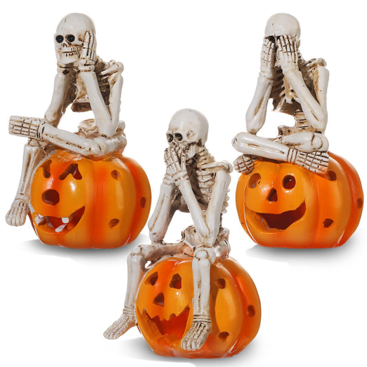 LemonRoad Set of 3 Skeletons Statue Hear See Speak No Evil Statue Figurines Resin Realistic Skull Decorations for Horror Haunted House Gothic Home Decor Party Favors(Sitting on Pumpkin)