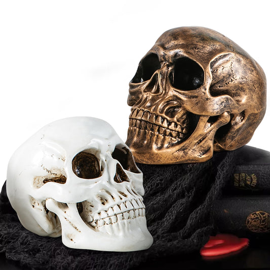 Mowtanco Halloween Skull Statues – Set of 2 Resin Skeleton Head Decorations (Gold & White) – 7.7" Realistic Skull Decor for Indoor Halloween Party, Tabletop Centerpiece, Spooky Home Accents