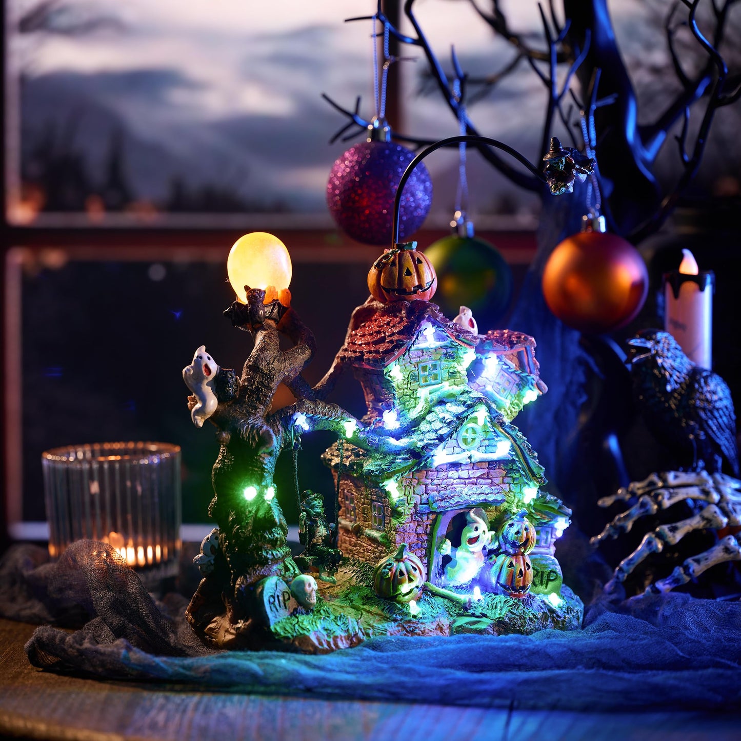 Valery Madelyn Halloween Decorations, Lighted Halloween Village Houses with Music and LED Lights, Resin Spooky Town Flying Witch and Haunted House for Home and Party Table Desk Mantel, 12 Inch